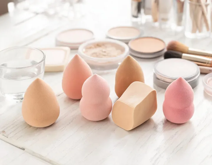 beauty sponge on a cosmetics bench, illustration only